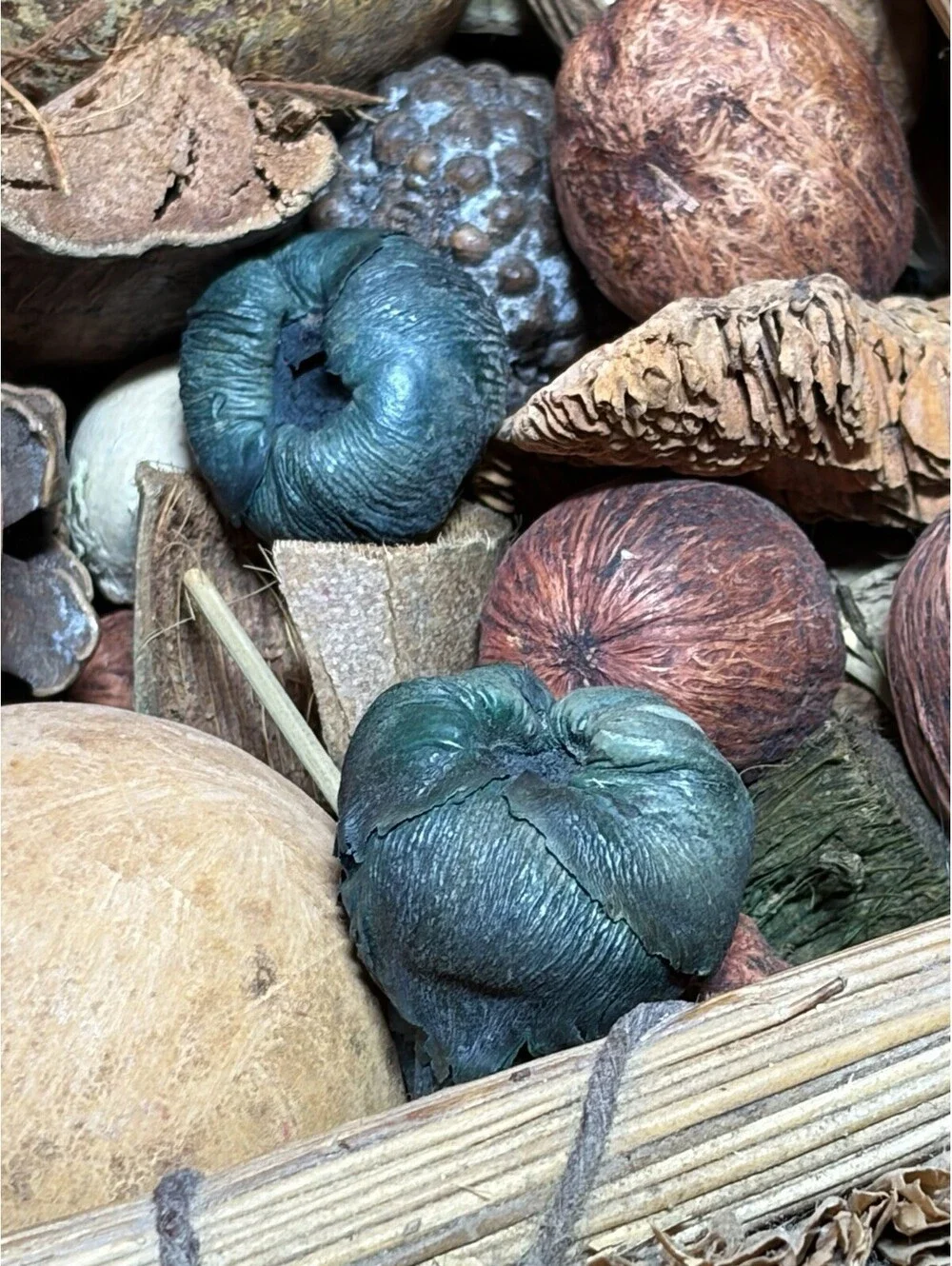 woven grass basket assortment of dried botanical potpourri